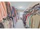 Walk-in closet featuring built-in shelving and clothing racks at 197 Hickory Pointe Dr, Acworth, GA 30101