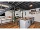 Spacious finished basement with a staircase, bar, and living area, perfect for entertaining and relaxing at 2681 Linnwood Se Dr, Smyrna, GA 30080