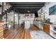 Finished basement offering bar, lounge and kitchen spaces for flexible living at 2681 Linnwood Se Dr, Smyrna, GA 30080