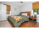 Comfortable bedroom featuring hardwood floors, natural light, and tasteful decor, creating a relaxing retreat at 2681 Linnwood Se Dr, Smyrna, GA 30080