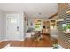 Bright dining area with hardwood floors, built-in seating, and modern décor creates a warm and inviting atmosphere at 2681 Linnwood Se Dr, Smyrna, GA 30080