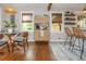 Open concept kitchen features modern appliances, an island with seating, and decorative wood accents at 2681 Linnwood Se Dr, Smyrna, GA 30080