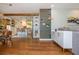 Bright, open-concept living space featuring hardwood floors and stylish furnishings with kitchen access at 2681 Linnwood Se Dr, Smyrna, GA 30080