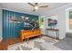Bright office with a modern desk setup, custom shelving, and large windows, perfect for productivity and inspiration at 2681 Linnwood Se Dr, Smyrna, GA 30080