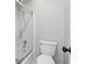 Bathroom featuring shower and tub combination with white toilet at 320 Rossiter Rdg, Alpharetta, GA 30022