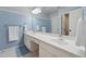 Bathroom featuring double vanity sinks, and neutral paint at 320 Rossiter Rdg, Alpharetta, GA 30022