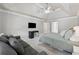 Bright main bedroom with vaulted ceilings, carpeting, and view to bathroom at 320 Rossiter Rdg, Alpharetta, GA 30022