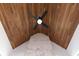 Unique tongue and groove ceiling design with a modern ceiling fan creating visual interest at 9770 Coleman Rd, Roswell, GA 30075