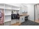 Mud room features cubbies, bench, and a sink at 9770 Coleman Rd, Roswell, GA 30075