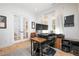 Home office with french doors, natural light, and space for a desk setup at 9770 Coleman Rd, Roswell, GA 30075