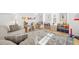 Spacious playroom with a sofa and toys at 9770 Coleman Rd, Roswell, GA 30075
