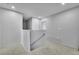 View of second floor landing at the top of a staircase with white trim and gray walls at 1386 Ben Park Way, Grayson, GA 30017