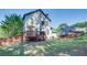 The back of the home features a spacious yard, deck, and privacy fence at 2604 Porchside Se Pl, Atlanta, GA 30316
