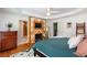 Bright bedroom featuring unique fireplace, television, and a cozy bed with stylish decor at 2604 Porchside Se Pl, Atlanta, GA 30316