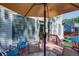 The outdoor deck features a dining set with a large umbrella, with stairs down to the fenced backyard at 2604 Porchside Se Pl, Atlanta, GA 30316