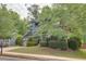 A charming two-story home with a well-maintained lawn and lush landscaping at 2604 Porchside Se Pl, Atlanta, GA 30316