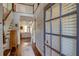 Bright foyer with hardwood floors, staircase, and views into the open-concept living spaces at 2604 Porchside Se Pl, Atlanta, GA 30316