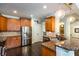 Modern kitchen with stainless steel refrigerator and pendant lighting at 2604 Porchside Se Pl, Atlanta, GA 30316
