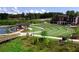 Community park featuring lawns and a walking trail along a scenic pond, great for outdoor activities at 4040 Sierra Vista Cir, Cumming, GA 30040