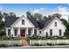 Beautiful home showcasing white picket fence and a well-manicured front yard at 43 Wickford Way, Villa Rica, GA 30180