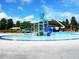 Community pool with water features, a slide, and lounge chairs providing a relaxing atmosphere at 43 Wickford Way, Villa Rica, GA 30180