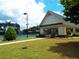 Tennis courts with a shaded shelter, offering a great place to play and relax at 43 Wickford Way, Villa Rica, GA 30180
