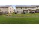 Large grassy backyard featuring lush green landscaping at 4370 Stone Gate Way # 97, Atlanta, GA 30344