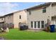 Backyard with a grassy lawn and privacy fence around the property at 4370 Stone Gate Way # 97, Atlanta, GA 30344
