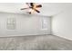 Large main bedroom featuring carpet, ceiling fan, and natural light at 4370 Stone Gate Way # 97, Atlanta, GA 30344