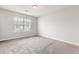Bright bedroom with neutral carpet and large window allowing for natural light at 4370 Stone Gate Way # 97, Atlanta, GA 30344