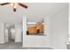 Open-concept space with views to the kitchen and staircase at 4370 Stone Gate Way # 97, Atlanta, GA 30344