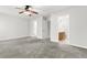 Main bedroom with en suite bathroom, neutral paint, and ceiling fan at 4370 Stone Gate Way # 97, Atlanta, GA 30344