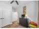 Bedroom featuring ceiling fan, closet, and hardwood floors at 448 Marston Pass, Acworth, GA 30102