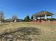 Open community space with a gazebo and seating offers a relaxing area for residents at 448 Marston Pass, Acworth, GA 30102