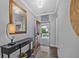 Elegant entryway featuring hardwood floors, a console table, and a view of the front yard at 448 Marston Pass, Acworth, GA 30102