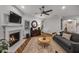 Comfortable living room featuring a fireplace and hardwood floors at 448 Marston Pass, Acworth, GA 30102
