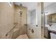 Spacious walk-in shower features tile surround, handheld sprayer, and glass partition at 448 Marston Pass, Acworth, GA 30102