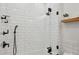 Bathroom featuring subway tile, modern shower, and bathtub with bronze fixtures at 1058 Piedmont Ave # 103, Atlanta, GA 30309