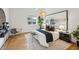 Stylishly furnished bedroom with modern decor, a large bed, and ample natural light from the window at 1058 Piedmont Ave # 103, Atlanta, GA 30309