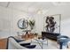 Stylishly furnished living room with hardwood floors, modern lighting, and access to the building at 1058 Piedmont Ave # 103, Atlanta, GA 30309