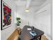Home office featuring modern artwork and a sleek desk with a transparent chair at 1058 Piedmont Ave # 103, Atlanta, GA 30309
