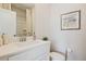 Clean, bright bathroom with modern fixtures, white cabinets and toilet at 1895 Deco Dr, Kennesaw, GA 30144