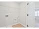 The laundry room offers a wire rack for storage at 1895 Deco Dr, Kennesaw, GA 30144