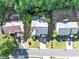 Overhead view of the property showcases the well-maintained yards and mature trees at 338 Santa Anita Ave, Woodstock, GA 30189