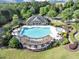 A relaxing community pool with lounge chairs and shaded pergola at 338 Santa Anita Ave, Woodstock, GA 30189