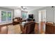 Inviting living room featuring hardwood floors, a cozy fireplace, and ample natural light at 338 Santa Anita Ave, Woodstock, GA 30189