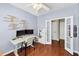 Another view of the bright office with hardwood floors and French doors at 338 Santa Anita Ave, Woodstock, GA 30189