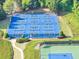 Community pickleball courts in a green neighborhood at 338 Santa Anita Ave, Woodstock, GA 30189