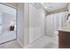 Bathroom featuring tiled floors, closet and a shower with patterned curtains at 3788 Chattahoochee Summit Se Dr # 22, Atlanta, GA 30339