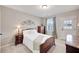 Comfortable bedroom featuring wood furniture, and plenty of natural light at 3788 Chattahoochee Summit Se Dr # 22, Atlanta, GA 30339